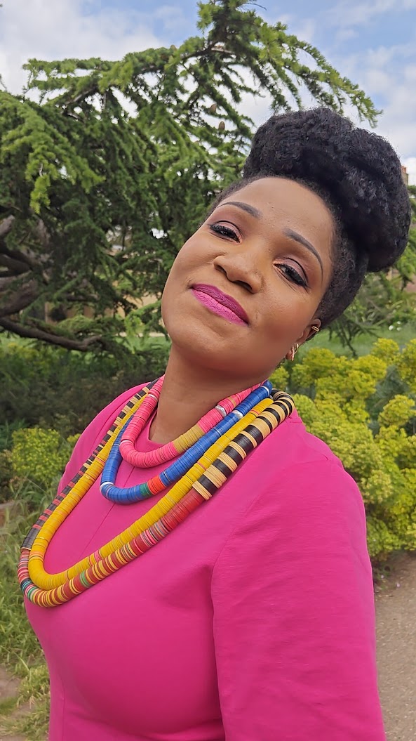 Black woman showing statement jewellery made in london – Ethical, Hand-Made & Unapologetically Bold