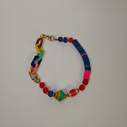 Colorful beaded necklace on a light gray background
