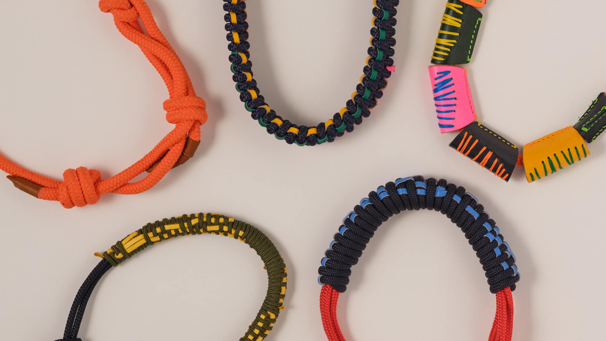 Featured collection of bright rope and leather necklaces. handcrafted by OKENSI in London 