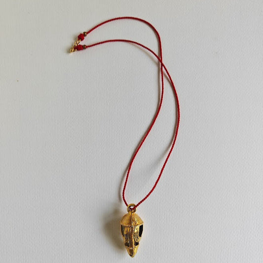 Coco Pod Pendant in lost-wax brass on red cotton cord, 37 cm, gold-plated clasp